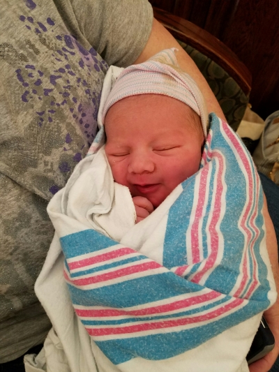 Finley Daniel Amie, son of Danielle and Nathan Amie, was born at 10:18 a.m. on Mardi Gras at the BRG Birth Center.